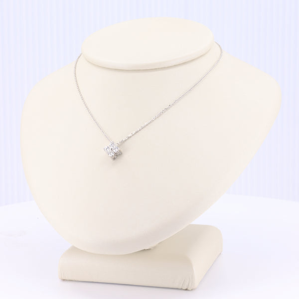 Medium quatrefoil diamond pendant in white gold on an 18-inch chain by Kizer-Cummings Jewelers