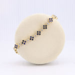 Load image into Gallery viewer, Sapphire Quatrefoil Bracelet with Diamond Accents in Yellow Gold
