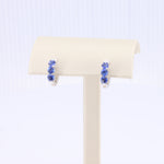 Load image into Gallery viewer, Sapphire Huggie Earrings in White Gold
