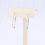 Load image into Gallery viewer, Elongated Oval Hoop Earrings in White Gold
