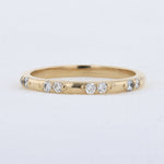 Load image into Gallery viewer, Spaced Diamond Wedding Band in Yellow Gold
