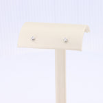 Load image into Gallery viewer, Diamond Stud Earrings in White Gold - 0.13cttw
