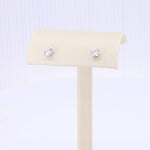 Load image into Gallery viewer, Elegant silver stud earrings with sparkling clear cubic zirconia stones, perfect for brides or special occasions.